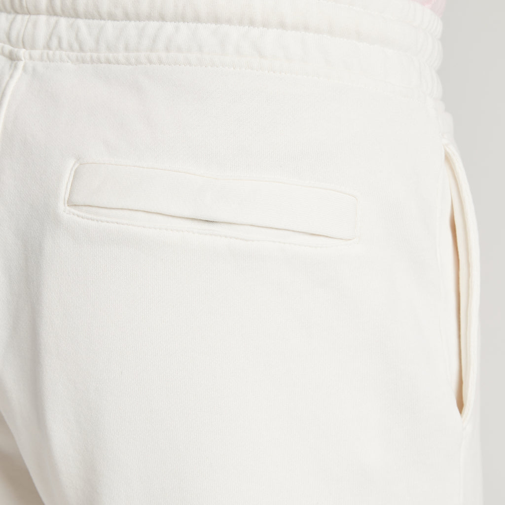 Pantaloni uomo bianchi in micro piquet tinta in capo, con tasca e coulisse, comfort premium