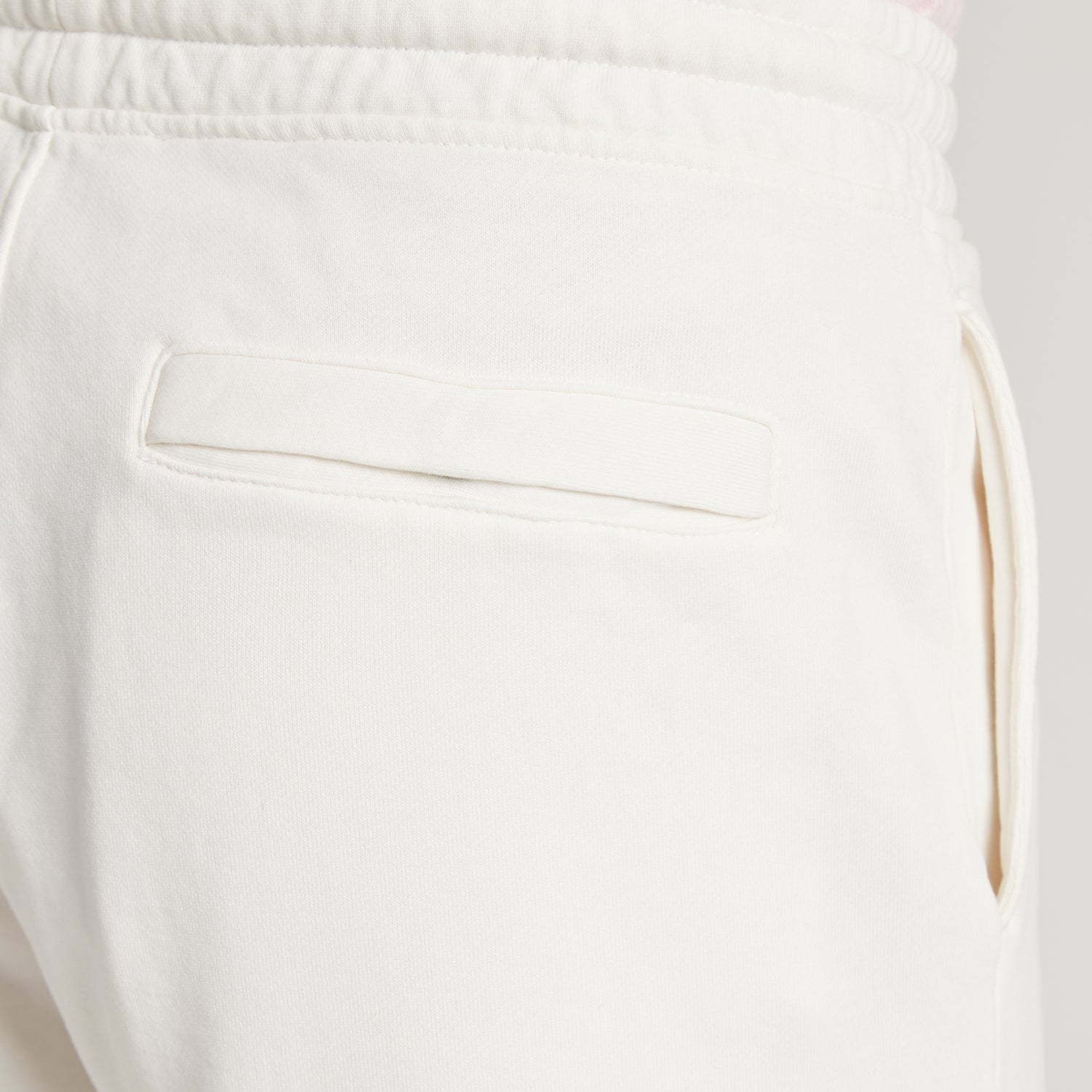 Pantaloni uomo bianchi in micro piquet tinta in capo, con tasca e coulisse, comfort premium