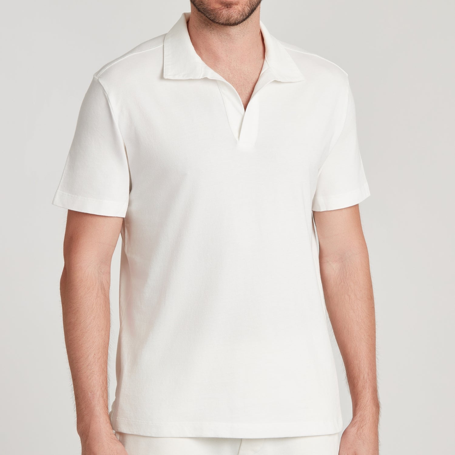 Polo uomo in micro piquet bianco, design veneziano e comfort premium