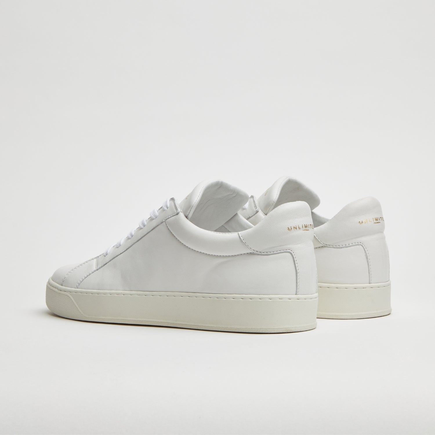Sneakers bianche uomo in pelle con dettaglio dorato, design veneziano e comfort premium